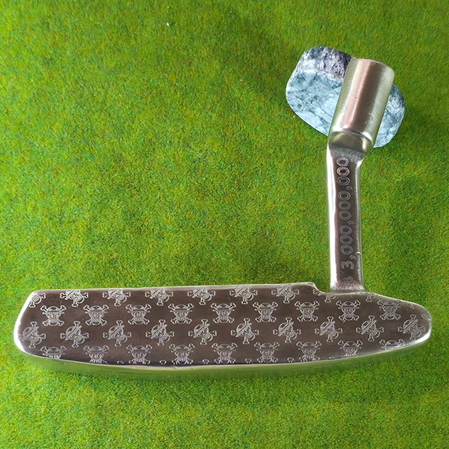 Golf putter head on a green background
One Piece golf putter, Custom golf putter, Anime golf club, Engraved putter, Straw Hat putter, Luffy golf club, Pirate golf club, One Piece gift, Anime golfer gift, Golf putter art, Unique putter design, Laser engraved putter, Golf gift for men, Scotty style putter, Collector golf club