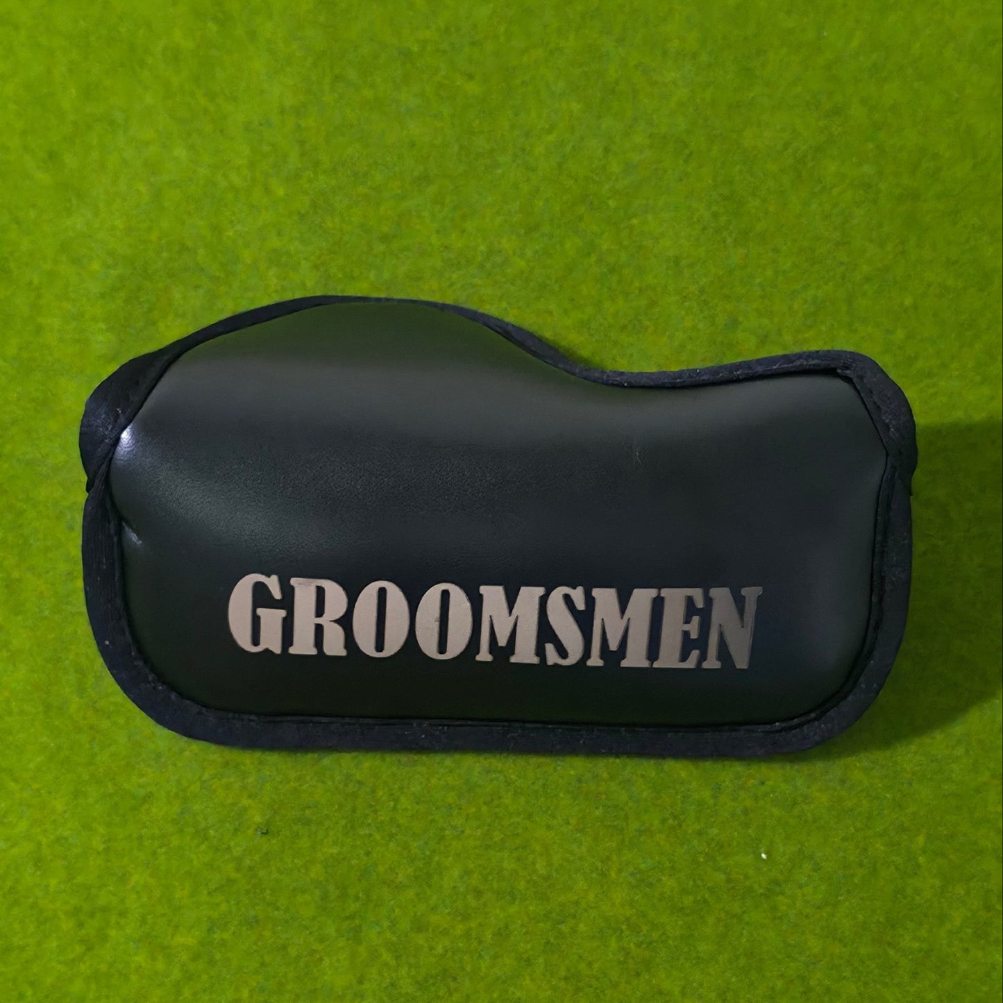 Black golf club putter blade head cover with 'GROOMSMEN' text on a green background
groomsmen golf gift
personalized putter set
wedding party golf gift
custom golf gift for men
engraved groomsmen gift
last minute wedding gift
golf gift box for groomsman
bachelor party golf gift
groom gift for groomsmen
golf accessories gift set