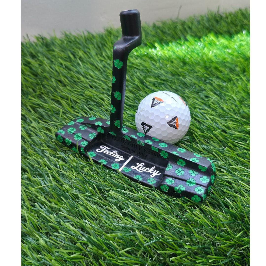 Custom black golf putter with green shamrock clover pattern, "Feeling Lucky" engraving, white alignment line, and Elite Golf Works USA branding — novelty St. Patrick’s Day golf gift for Irish golf lovers and collectors

custom golf putter

black putter head

green shamrock / clover pattern

“Feeling Lucky” engraving

alignment line

Elite Golf Works USA

St. Patrick’s Day golf gift

novelty golf club

Irish golf lovers

collectors