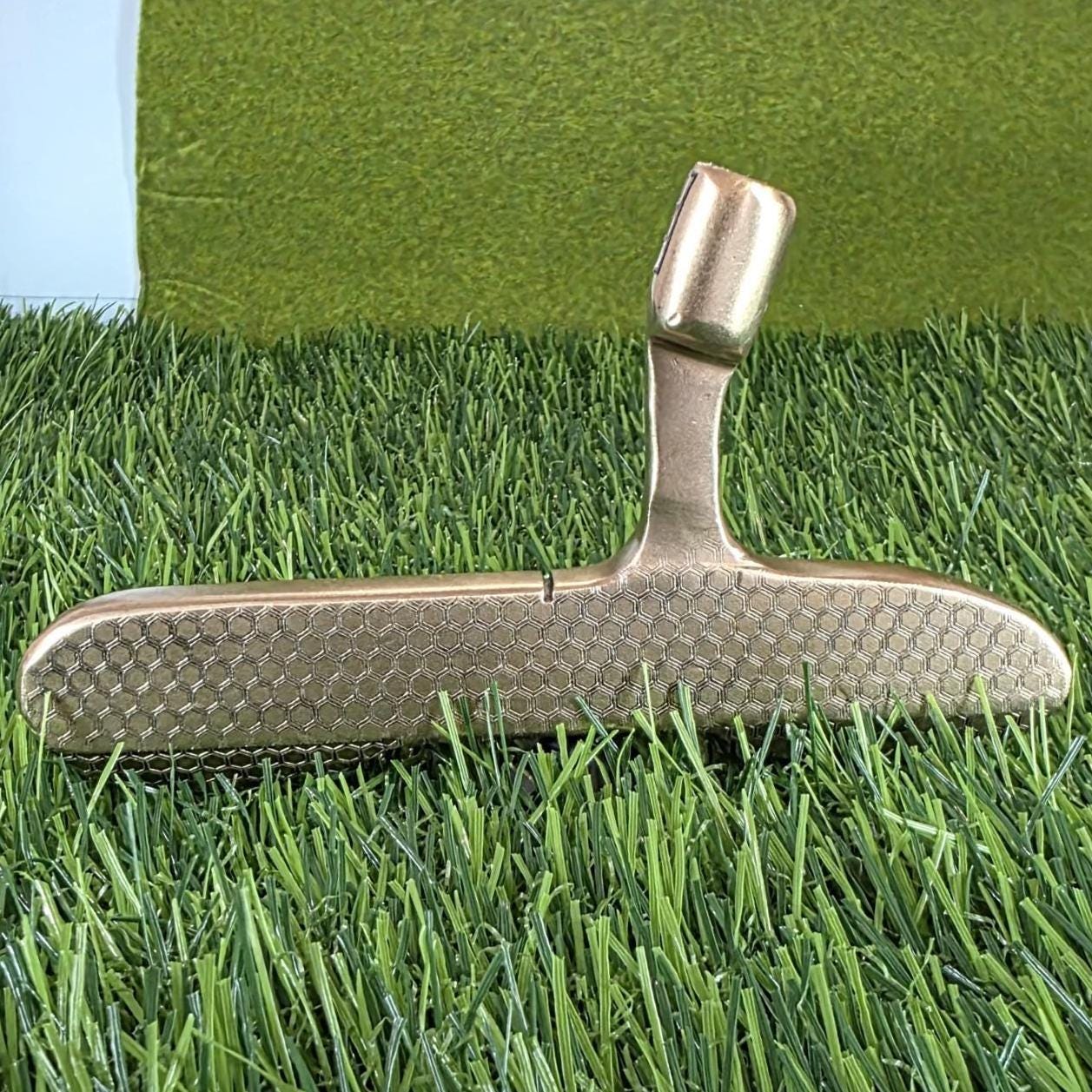 brass golf putter with full-face laser engraving