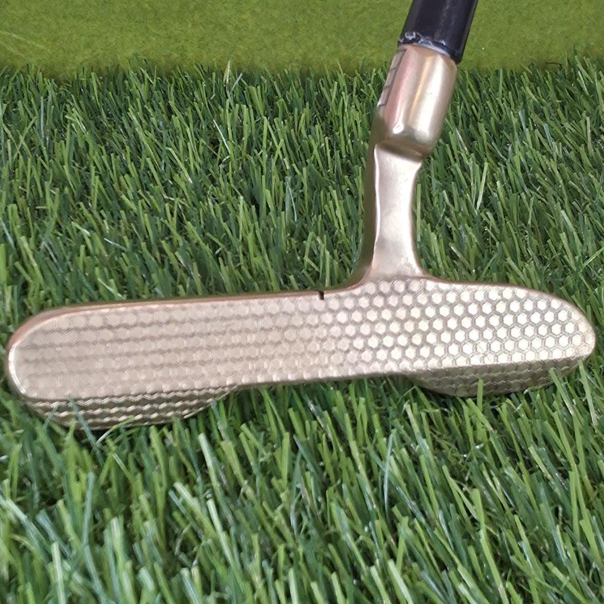 brass golf putter with full-face laser engraving