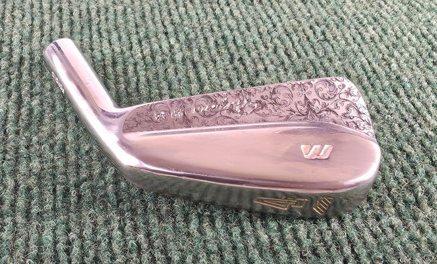 Custom engraved Mizuno 4 Iron with detailed floral scroll pattern. Unique golf club for players, collectors, and as a personalized golf gift. Perfect for Father’s Day, birthdays, weddings, or retirement. Durable steel iron designed for performance with a custom engraved finish. A one-of-a-kind Mizuno golf iron combining artistry and function, making it a standout piece for golf enthusiasts. engraved golf iron
custom mizuno iron
golf gift for him
engraved 4 iron custom golf club unique golf gift