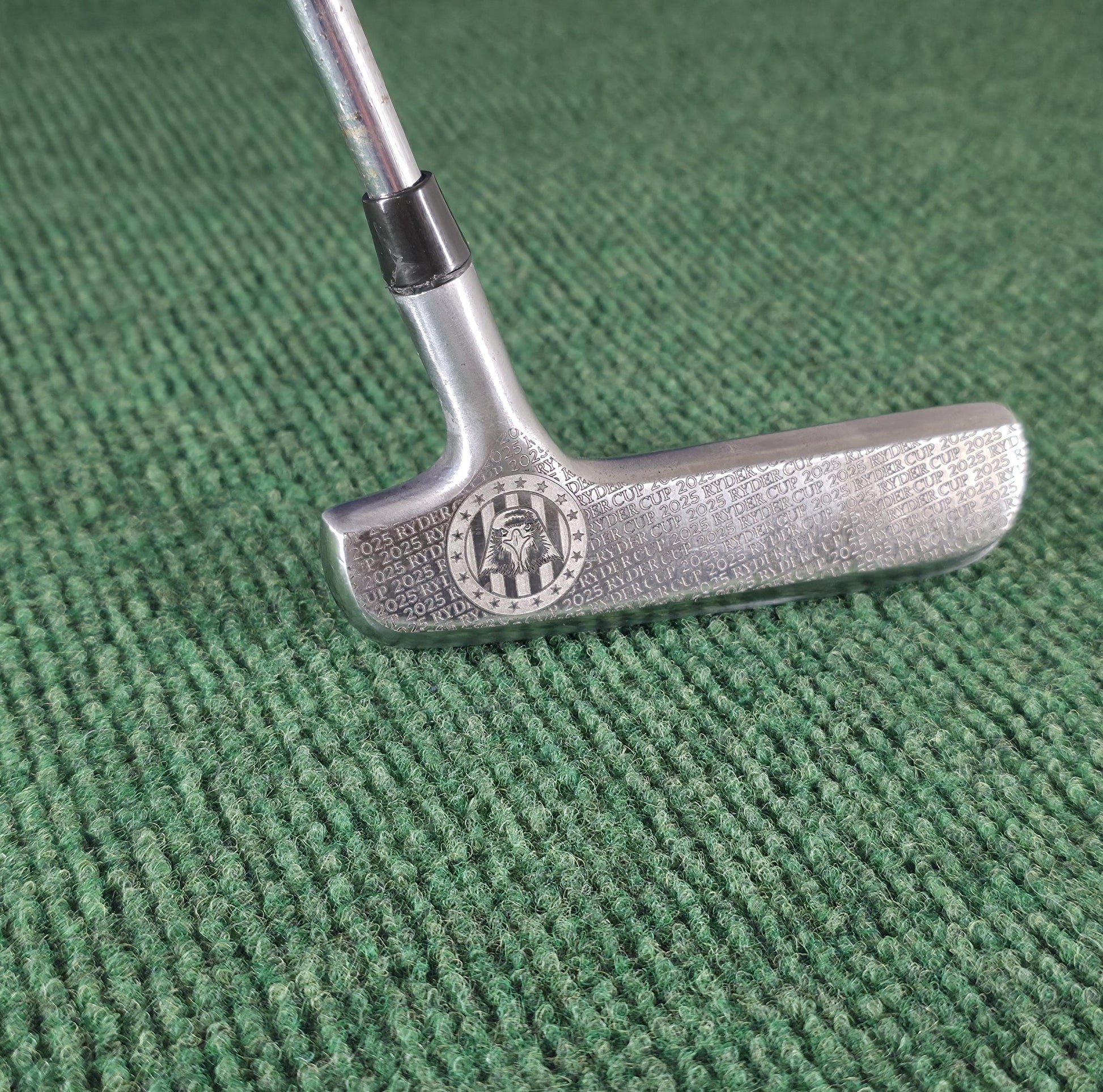 Custom engraved Spalding Cash-In putter inspired by the 2025 Ryder Cup. Features stars, eagle crest, and repeating Ryder Cup text pattern. Vintage-style engraved golf putter for collectors, players, and gift-giving. Perfect for Ryder Cup fans, golf history enthusiasts, or as a personalized golf gift. Durable steel putter head with laser engraving, combining artistry and performance in a one-of-a-kind golf collectible ryder cup putter spalding golf putter engraved golf club custom golf putter