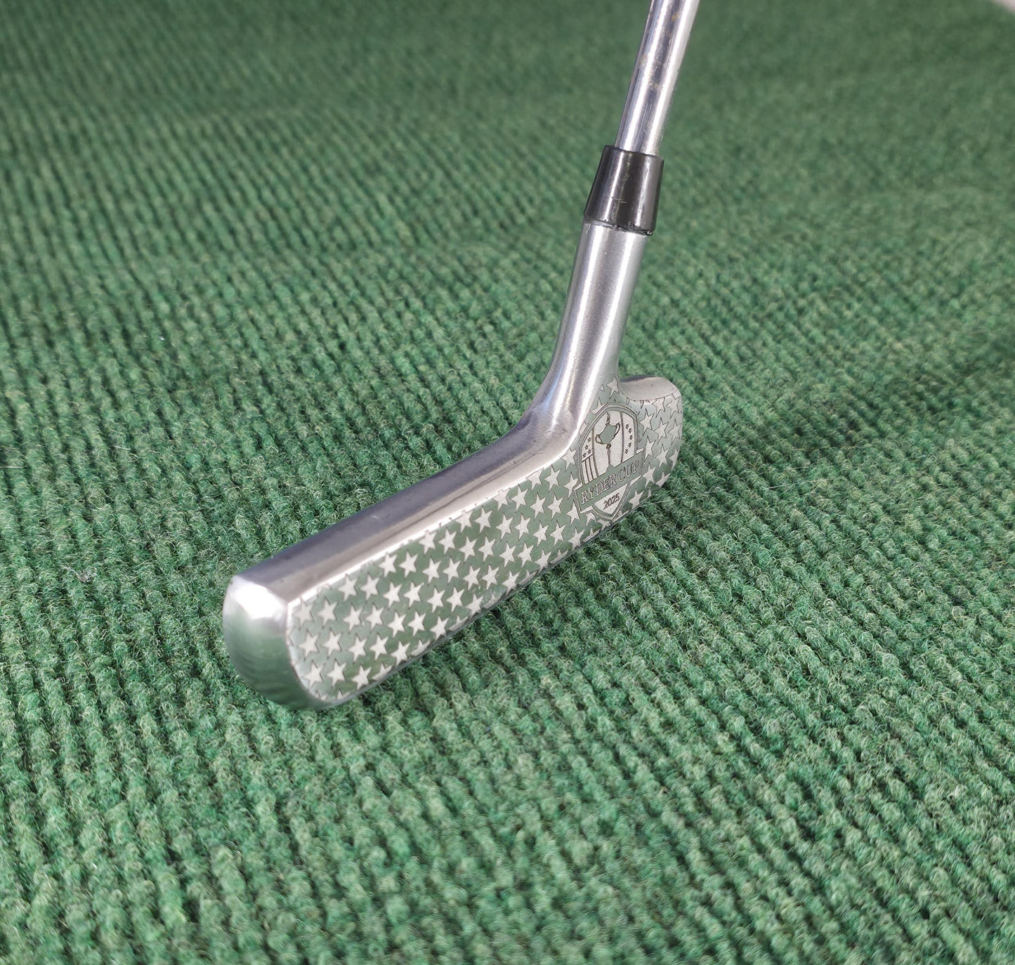 Custom engraved Spalding Cash-In putter inspired by the 2025 Ryder Cup. Features stars, eagle crest, and repeating Ryder Cup text pattern. Vintage-style engraved golf putter for collectors, players, and gift-giving. Perfect for Ryder Cup fans, golf history enthusiasts, or as a personalized golf gift. Durable steel putter head with laser engraving, combining artistry and performance in a one-of-a-kind golf collectible ryder cup putter spalding golf putter engraved golf club custom golf putter