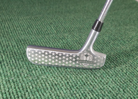 Custom engraved Spalding Cash-In putter inspired by the 2025 Ryder Cup. Features stars, eagle crest, and repeating Ryder Cup text pattern. Vintage-style engraved golf putter for collectors, players, and gift-giving. Perfect for Ryder Cup fans, golf history enthusiasts, or as a personalized golf gift. Durable steel putter head with laser engraving, combining artistry and performance in a one-of-a-kind golf collectible ryder cup putter spalding golf putter engraved golf club custom golf putter