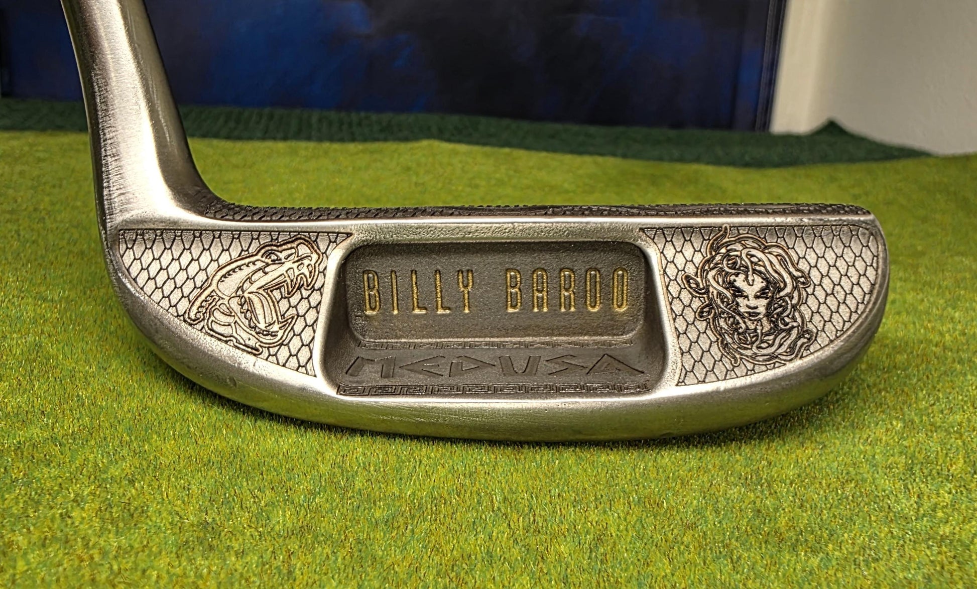Medusa-inspired engraved Ray Cook Billy Baroo putter with serpent scales, snake engraving, and detailed Medusa face design. Unique mythology-themed golf club that can be played or displayed as a collector’s piece. Custom laser engraved putter ideal for golf enthusiasts, mythology fans, and collectors. Perfect gift for Father’s Day, groomsmen, birthdays, or golf lovers who want a one-of-a-kind club with both style and attitude. medusa golf putter ray cook billy baroo engraved golf putter