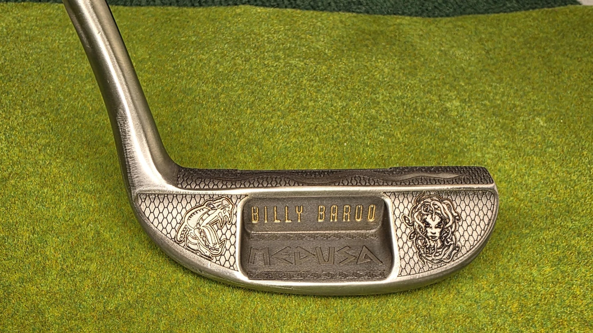 Medusa-inspired engraved Ray Cook Billy Baroo putter with serpent scales, snake engraving, and detailed Medusa face design. Unique mythology-themed golf club that can be played or displayed as a collector’s piece. Custom laser engraved putter ideal for golf enthusiasts, mythology fans, and collectors. Perfect gift for Father’s Day, groomsmen, birthdays, or golf lovers who want a one-of-a-kind club with both style and attitude. medusa golf putter ray cook billy baroo engraved golf putter