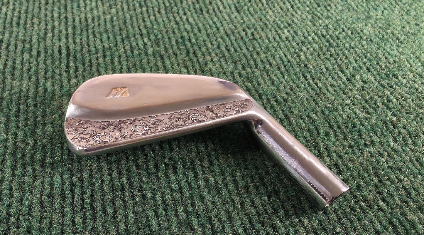 Custom engraved Mizuno 4 Iron with detailed floral scroll pattern. Unique golf club for players, collectors, and as a personalized golf gift. Perfect for Father’s Day, birthdays, weddings, or retirement. Durable steel iron designed for performance with a custom engraved finish. A one-of-a-kind Mizuno golf iron combining artistry and function, making it a standout piece for golf enthusiasts. engraved golf iron
custom mizuno iron
golf gift for him
engraved 4 iron custom golf club unique golf gift