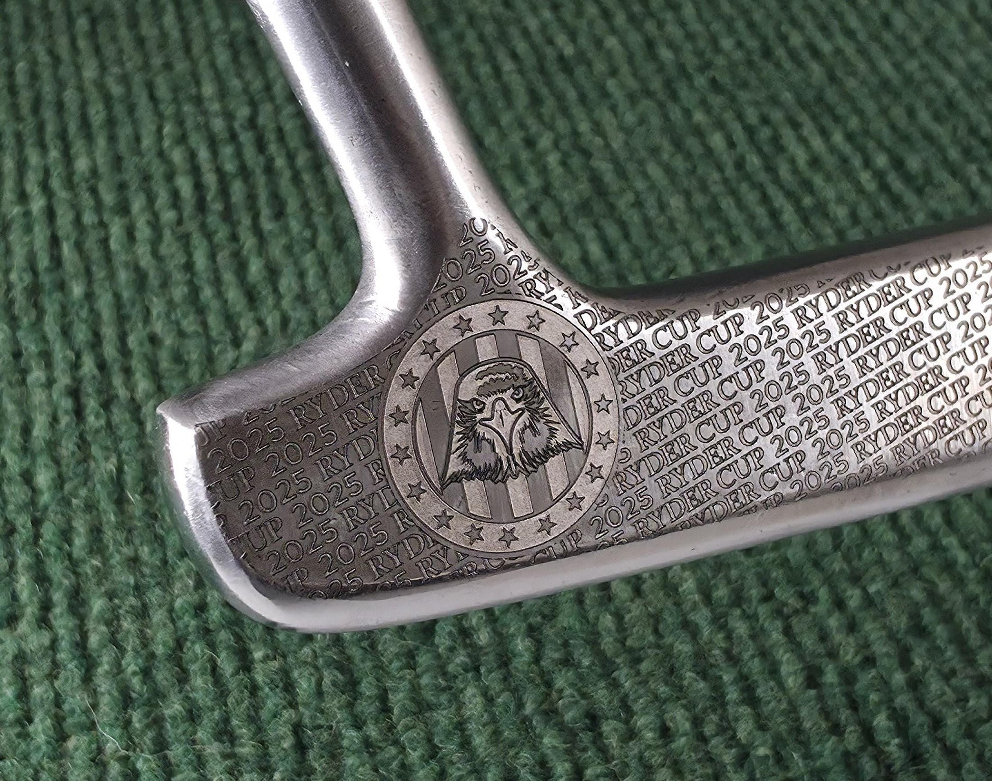 Custom engraved Spalding Cash-In putter inspired by the 2025 Ryder Cup. Features stars, eagle crest, and repeating Ryder Cup text pattern. Vintage-style engraved golf putter for collectors, players, and gift-giving. Perfect for Ryder Cup fans, golf history enthusiasts, or as a personalized golf gift. Durable steel putter head with laser engraving, combining artistry and performance in a one-of-a-kind golf collectible ryder cup putter spalding golf putter engraved golf club custom golf putter